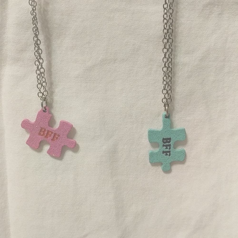 Two BFF friendship necklaces